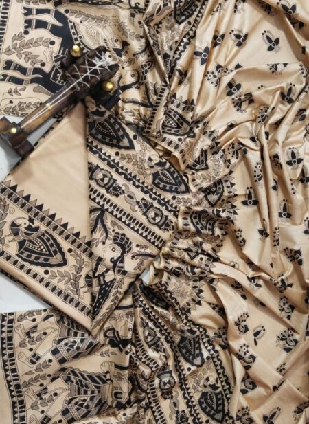 An unstitched cream Katan silk suit material set by Bhavya Lakshmi Fabrics featuring extensive black monochrome Madhubani prints of elephants, peacocks, and fish with geometric borders.