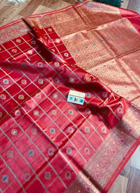Vibrant crimson red pure Bhagalpuri Munga silk saree from Bhavya Lakshmi Fabrics featuring gold zari checks with multi-color floral Meenakari butis and an intricate gold zari border