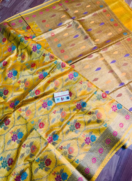 Vibrant golden yellow pure Bhagalpuri Munga silk saree from Bhavya Lakshmi Fabrics featuring a multi-color floral Meenakari jaal and an intricate gold zari border