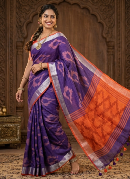 Bhavya Lakshmi Fabrics royal purple and vibrant orange handloom Pochampally Ikkat cotton linen blend saree with a silver border.