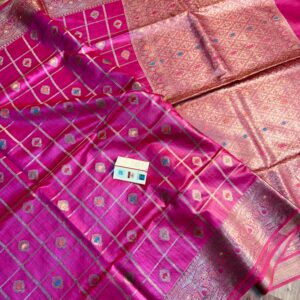 Vibrant Rani pink pure Bhagalpuri Munga silk saree from Bhavya Lakshmi Fabrics featuring gold zari checks with multi-color floral Meenakari butis and an intricate gold zari border