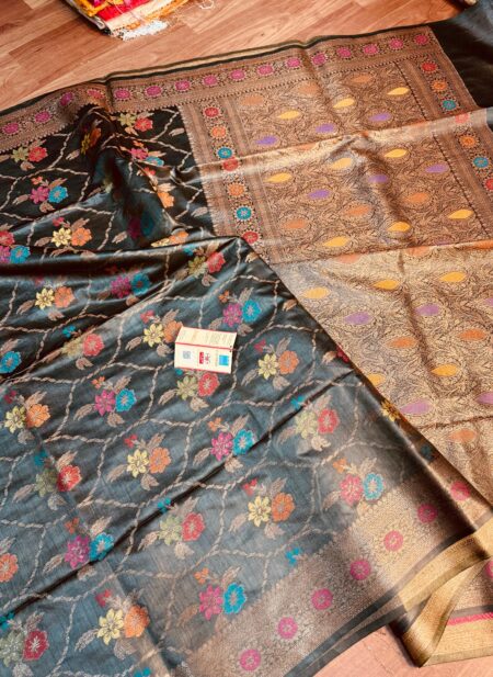 Sophisticated midnight black pure Bhagalpuri Munga silk saree from Bhavya Lakshmi Fabrics featuring an all-over multi-color floral Meenakari jaal and an intricate gold zari border