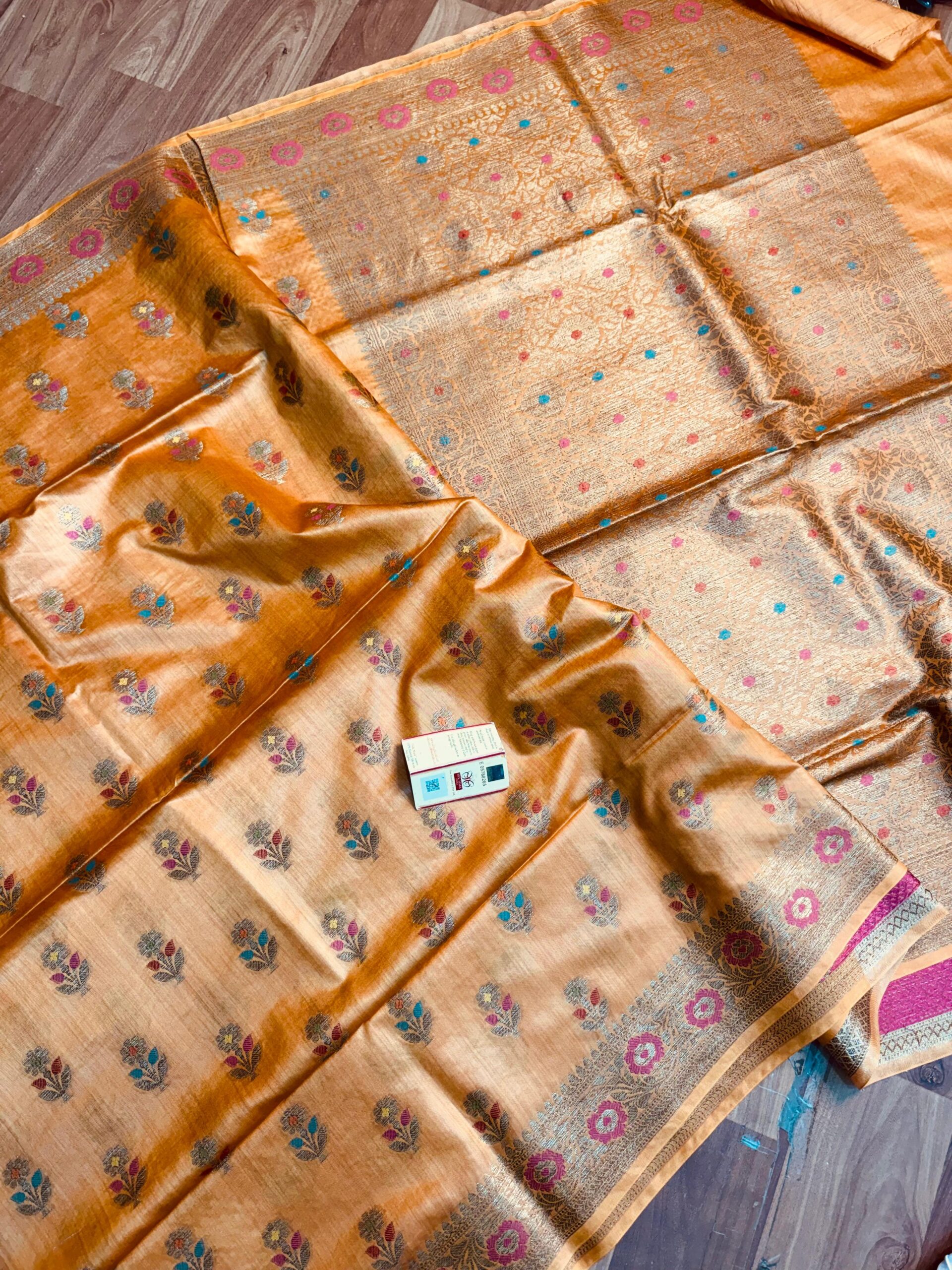 Mustard Yellow Pure Bhagalpuri Munga Silk Saree by Bhavya Lakshmi Fabrics (6) Vibrant mustard yellow pure Bhagalpuri Munga silk saree from Bhavya Lakshmi Fabrics featuring multi-color floral butis and an intricate gold zari border
