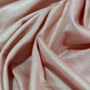 Sophisticated rose gold peach pure Tussar Munga silk fabric with a rich, textured weave for premium menswear.