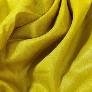 Vibrant golden yellow Tussar Munga pure silk fabric with a rich texture, ideal for premium men's ethnic wear.