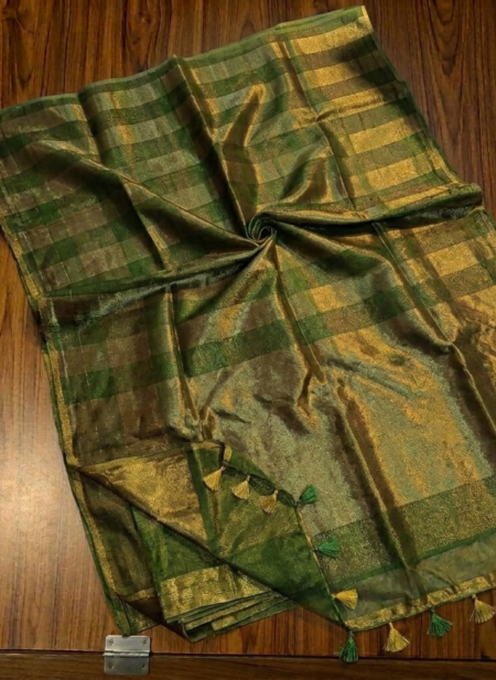 Sophisticated olive green and metallic gold zari striped tissue silk saree featuring intricate borders and matching tassel details.