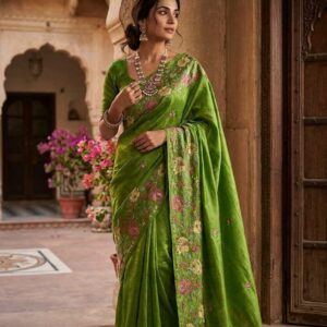 Bhavyaloom leaf green pure bhagalpuri tussar silk saree with pink floral hand embroidery draped on model