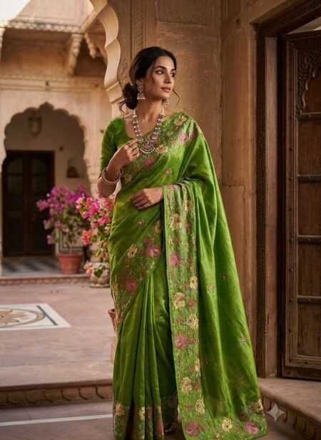 Bhavyaloom leaf green pure bhagalpuri tussar silk saree with pink floral hand embroidery draped on model